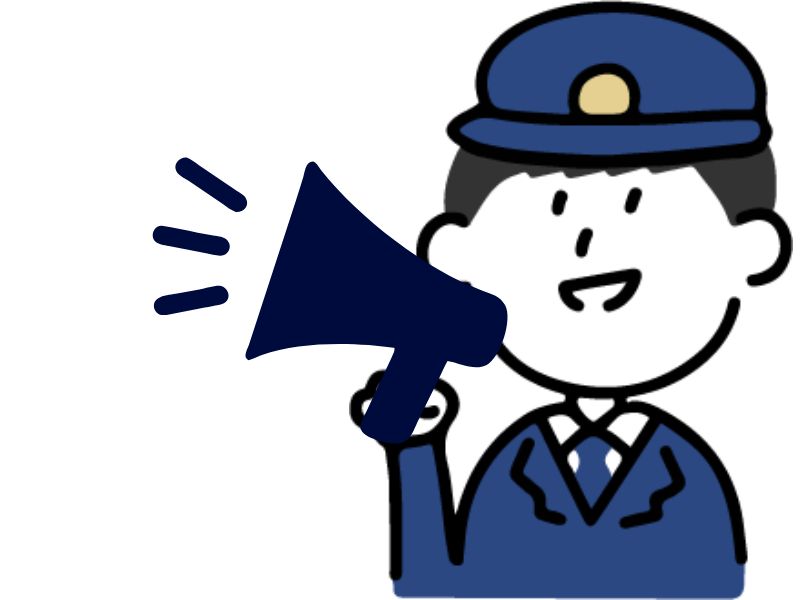 拡声器でアナウンスする駅員