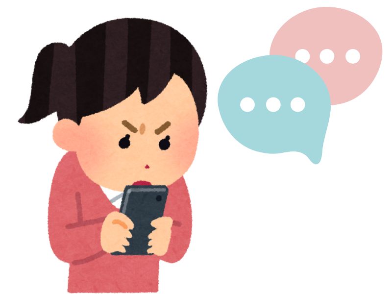 スマホでチャットするしかめ面の女性