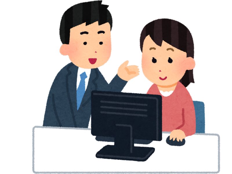 パソコンの指導を受ける人