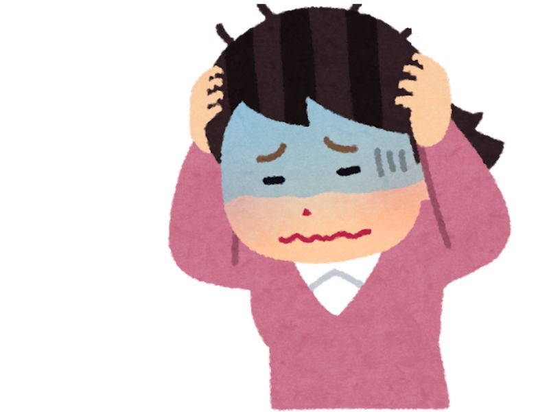 頭を抱える女性
