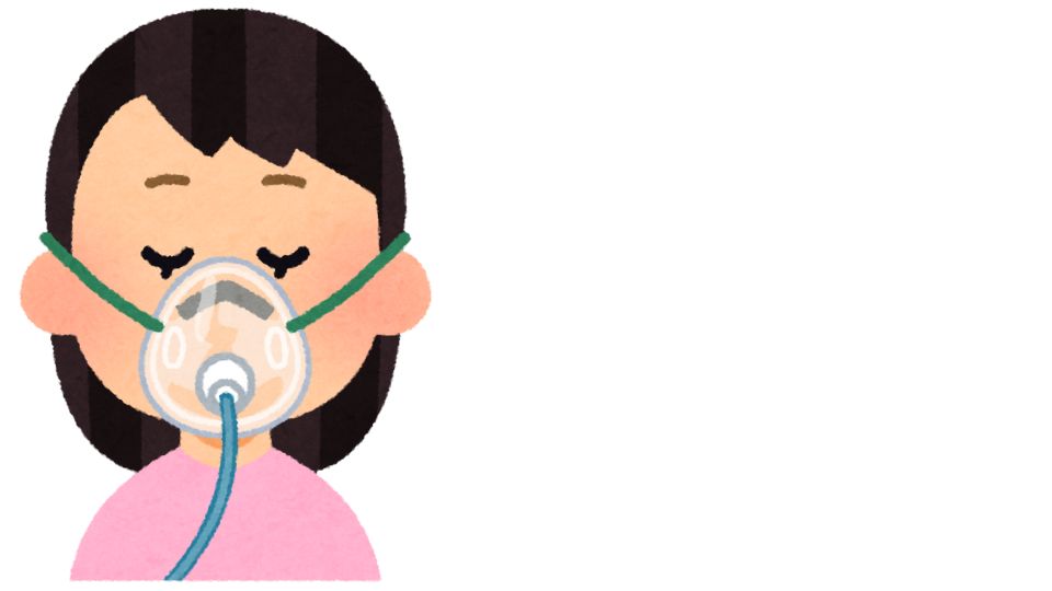 酸素マスクをつける人